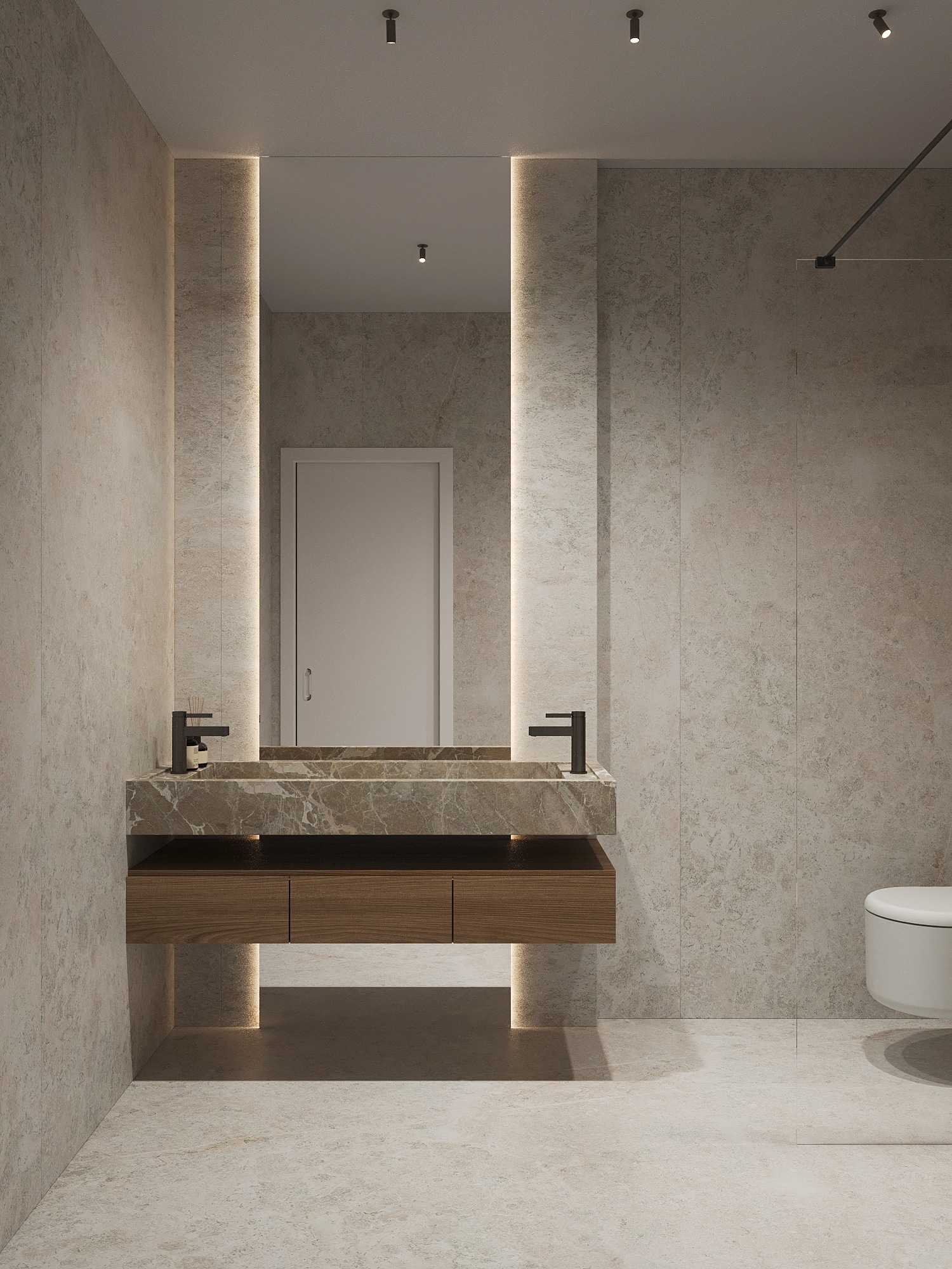 A marble bathroom with a floating vanity and a lit mirror niche