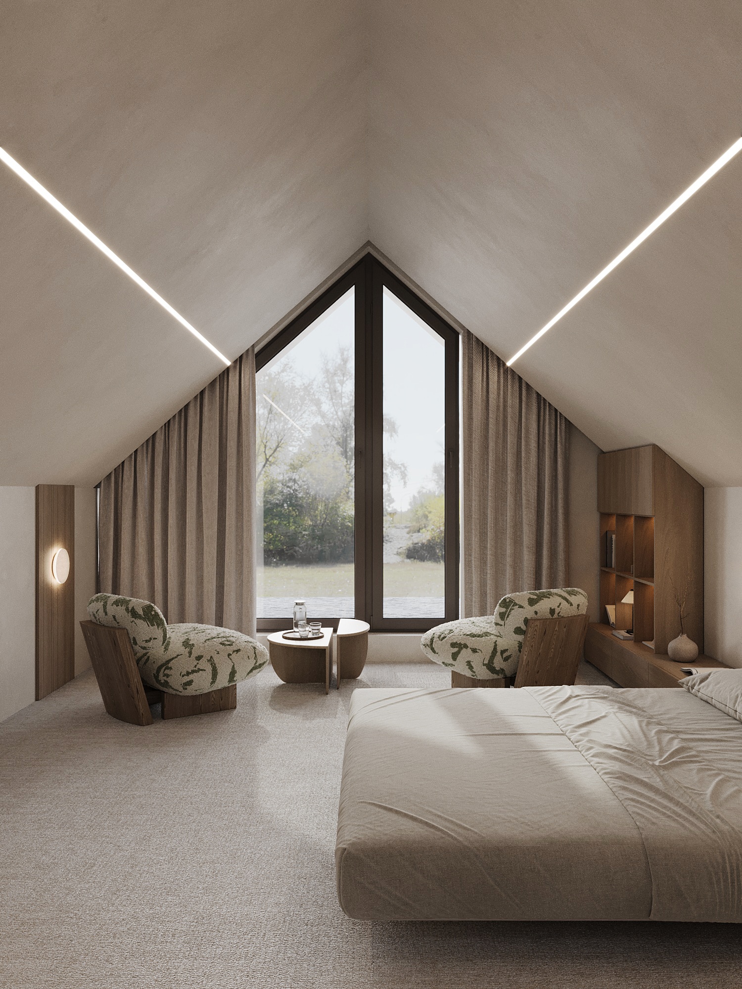 An attic bedroom with a tall gabled window and two lounge chairs in a panoramic apartment