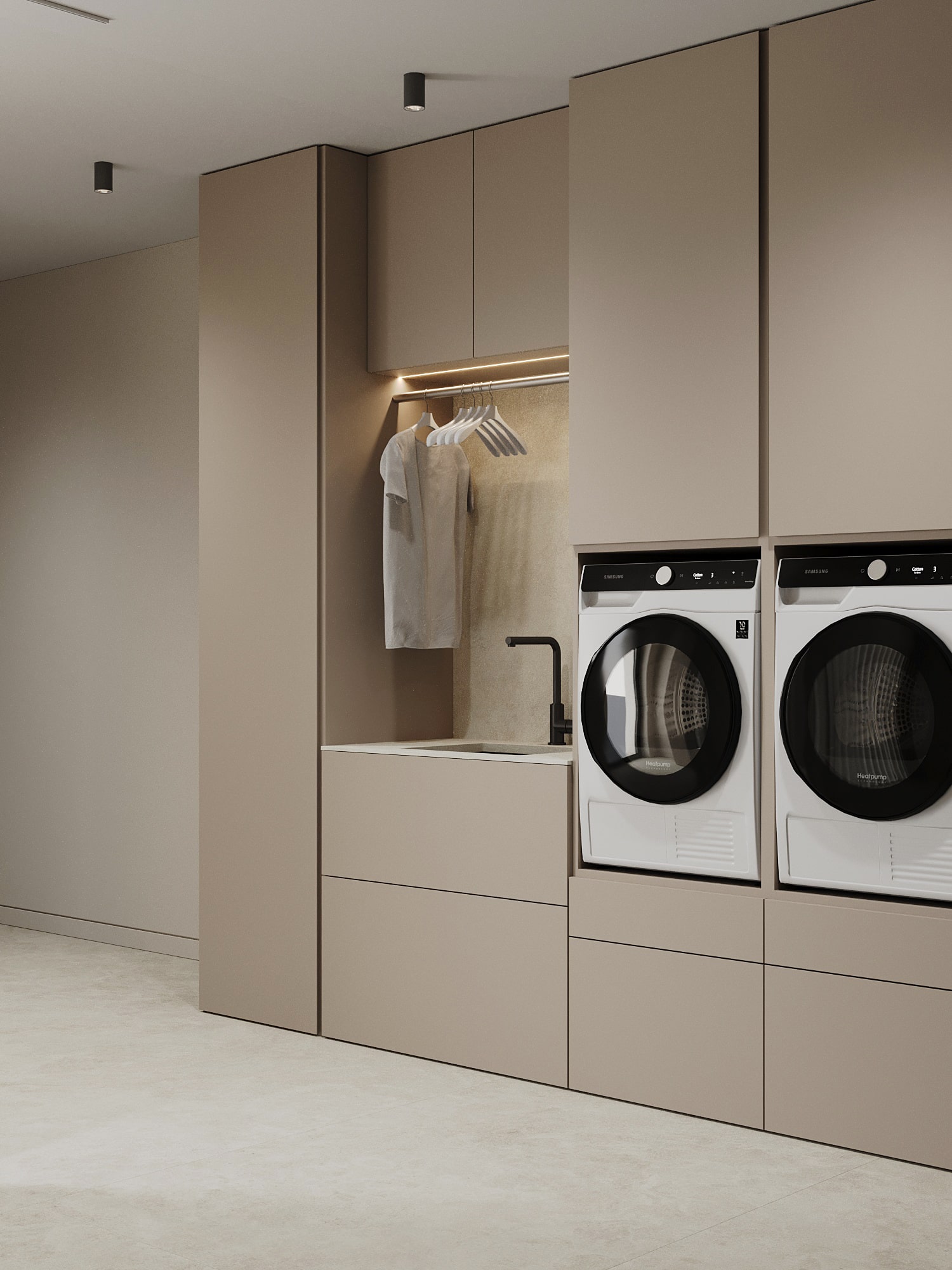 A laundry room with built-in cabinetry