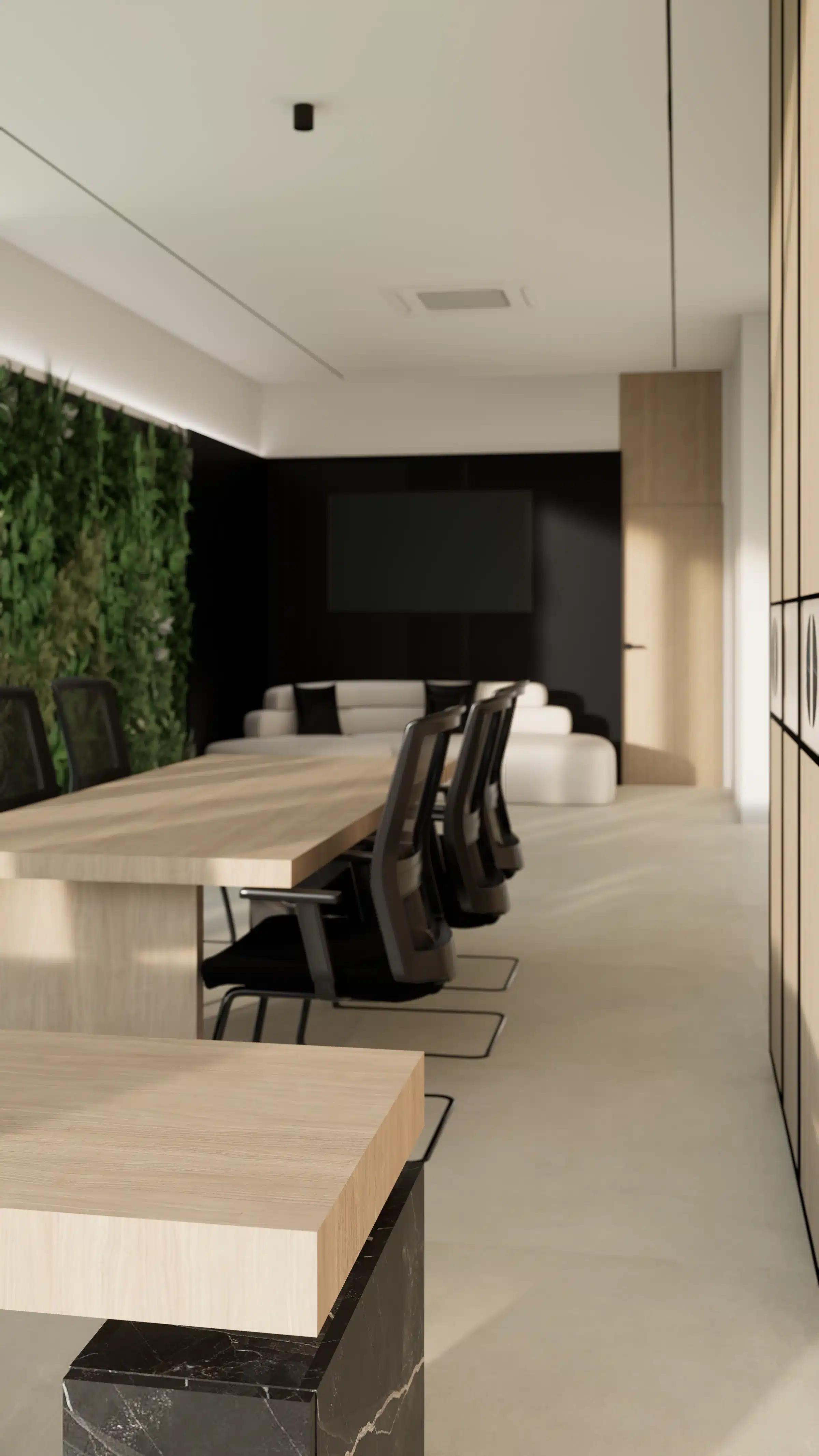A meeting corner with a living moss wall above timber